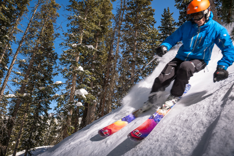 John Fullbright skiing at the Taos Valley Ski Area near Taos, New Mexico. Shot with the Elinchrom ELB 400 and the Pro Flash Head. Since I wasn't using Hypersonic with the Pro Heds, I instead opted to create a motion blur of John flying by my position. Image Data: Nikon D4, Nikkor 24-70mm f/2.8 lens @ 24mm, ISO 100, 1/250th sec at f/7.1.