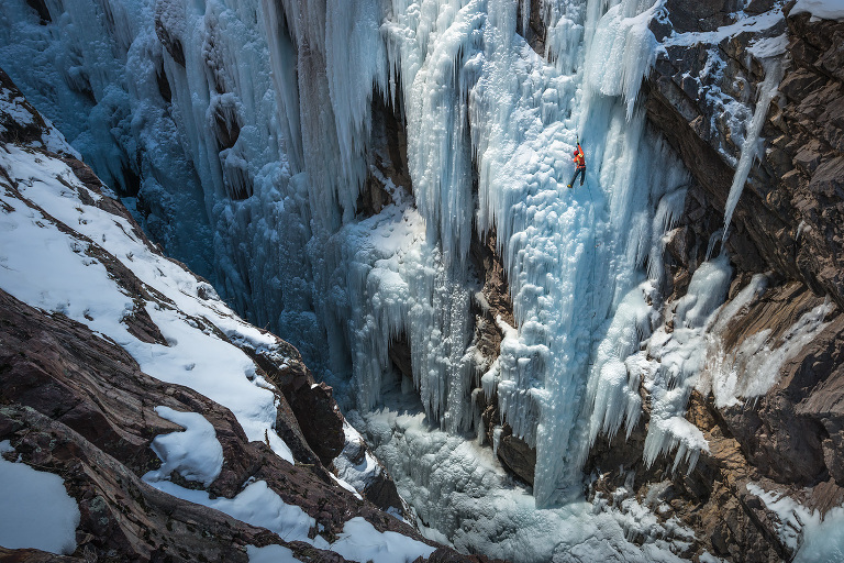 Dawn Glanc climbing a WI 5 pillar in the Ouray Ice Park in Ouray, Colorado.