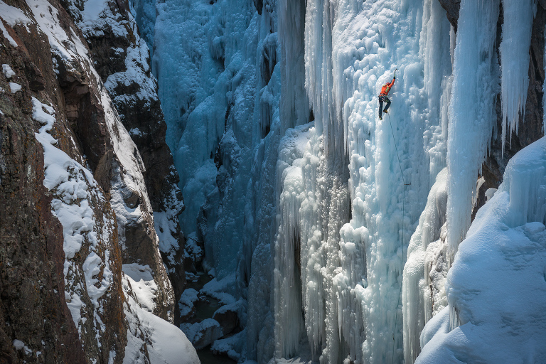 Dawn Glanc climbing a WI 5 pillar in the Ouray Ice Park in Ouray, Colorado.